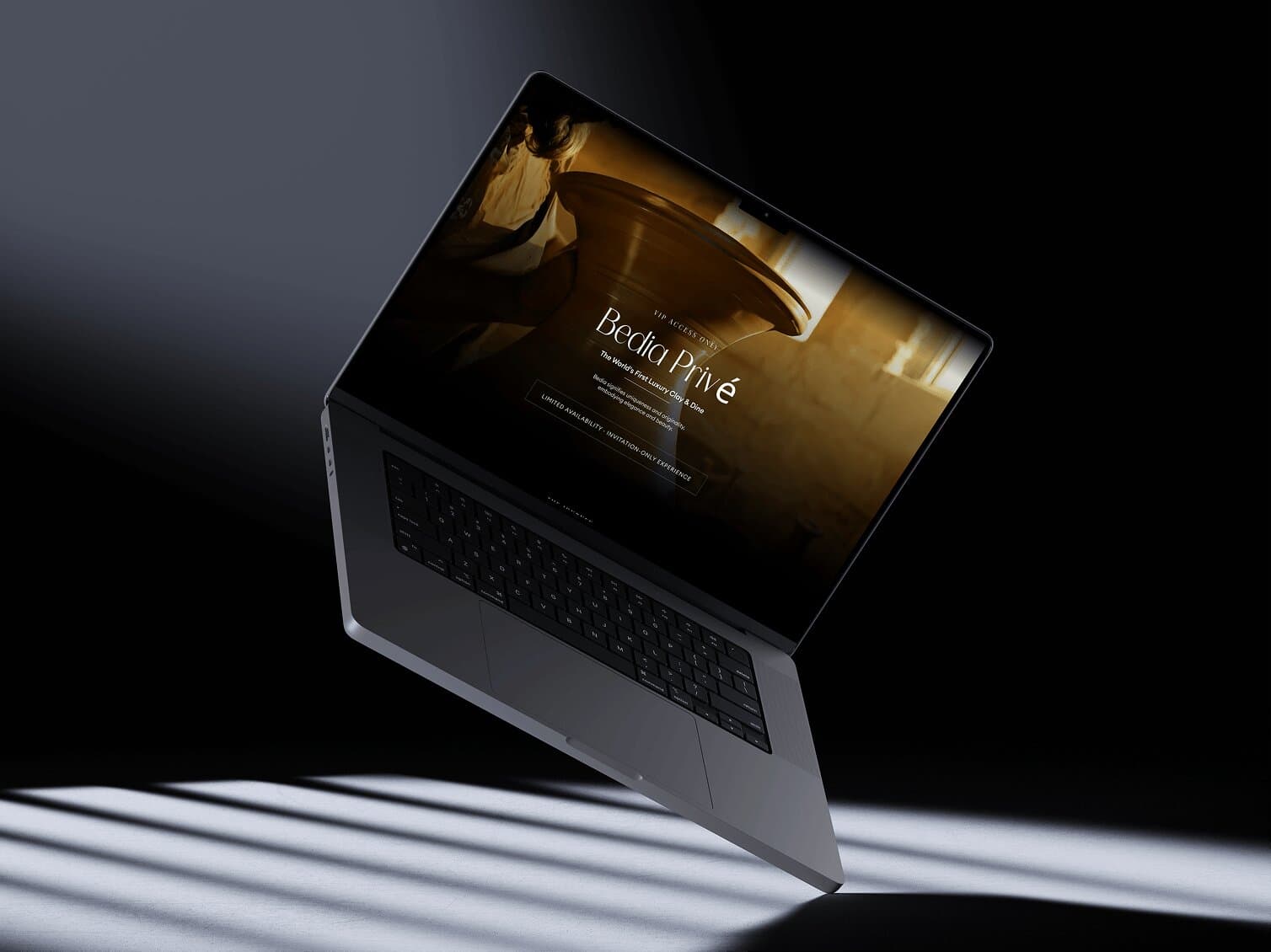 The Bedia Privé homepage on a laptop, cinematic pottery photography