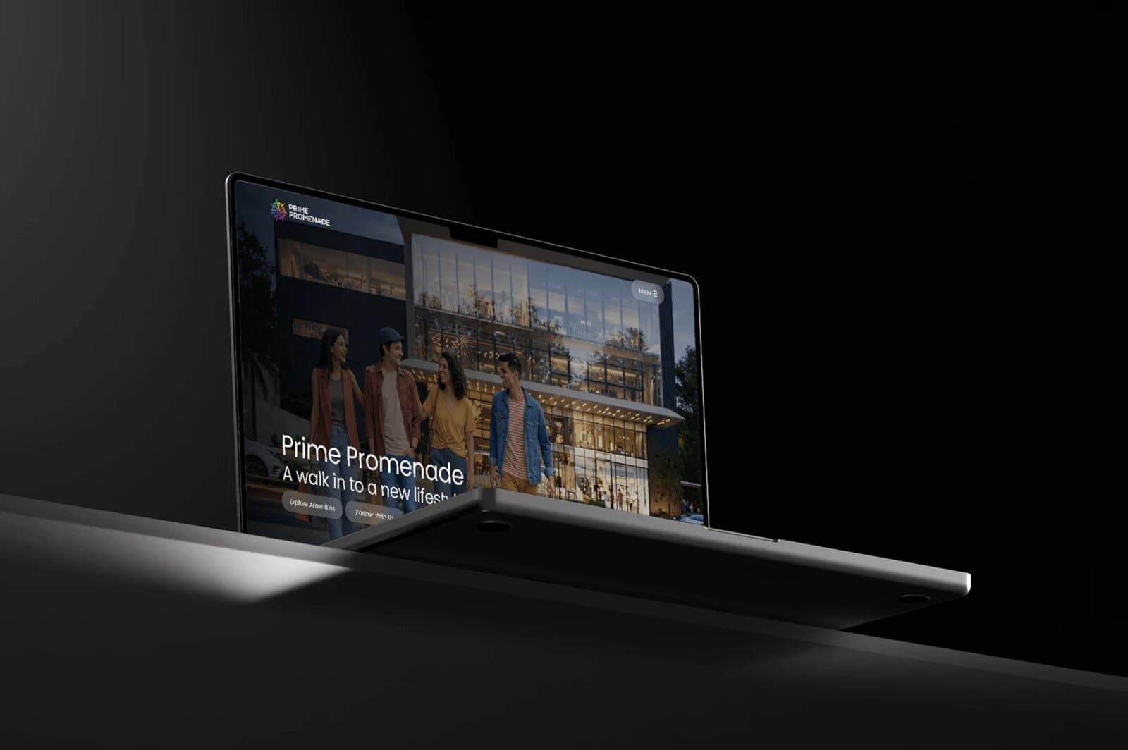 The Prime Promenade homepage on a laptop at dusk